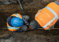 Workers Digging a Hole